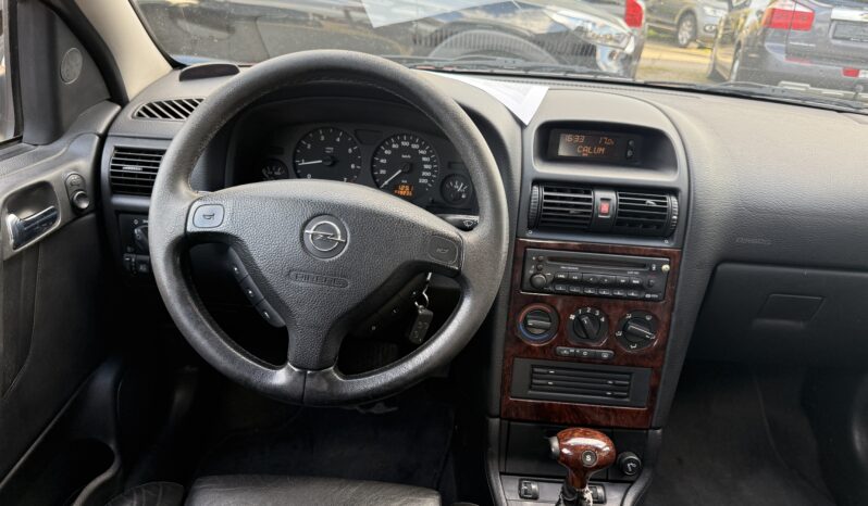 
								OPEL ASTRA pilns									