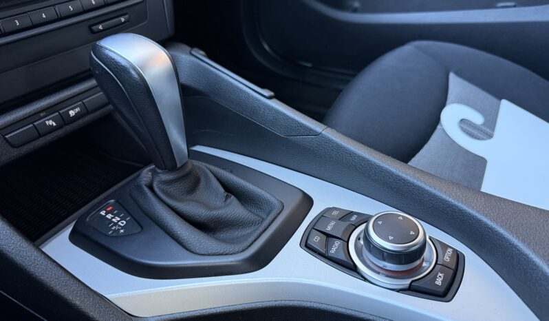 
								BMW X1 pilns									