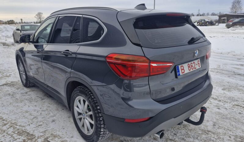 
								BMW X1 pilns									
