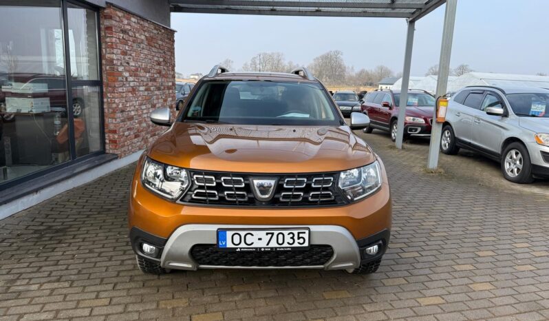 
								DACIA DUSTER pilns									