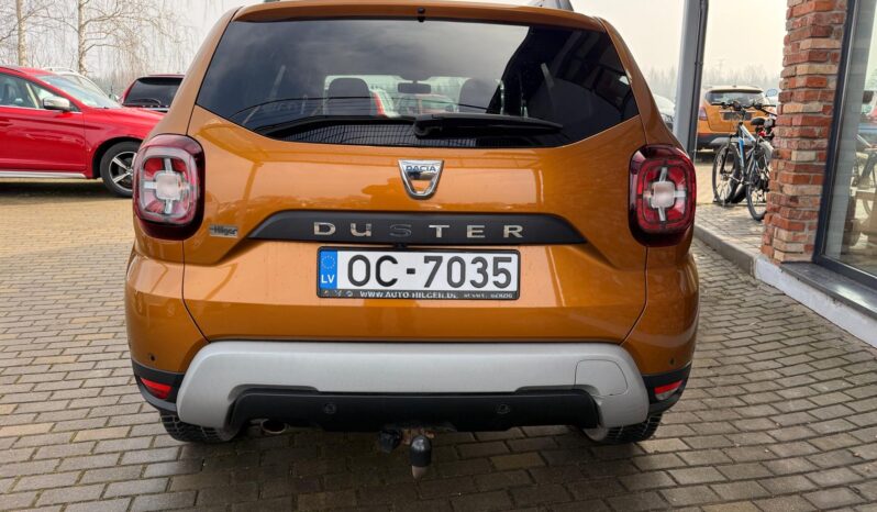 
								DACIA DUSTER pilns									