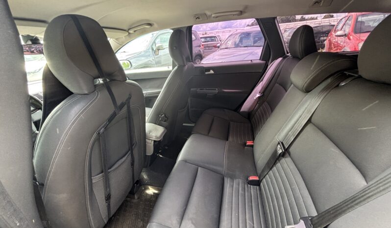 
								VOLVO V50 pilns									