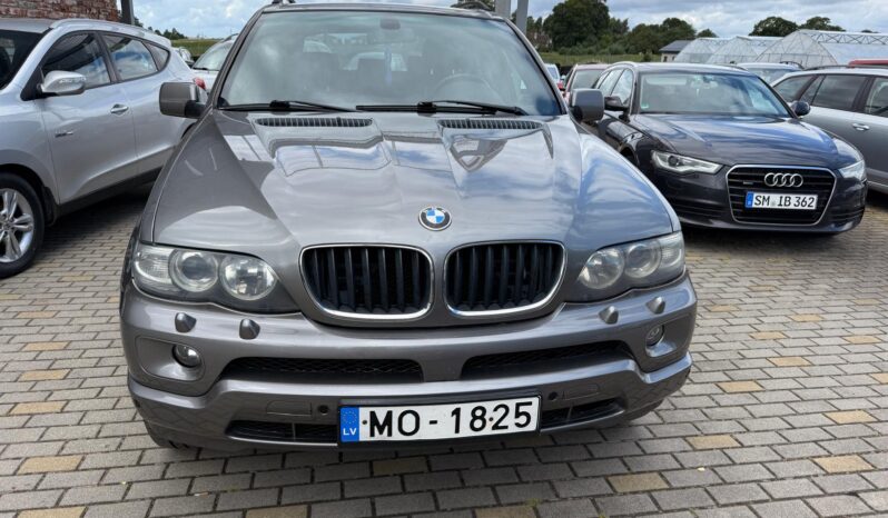 
								BMW X5 pilns									
