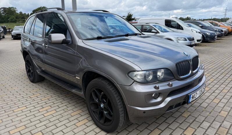 
								BMW X5 pilns									