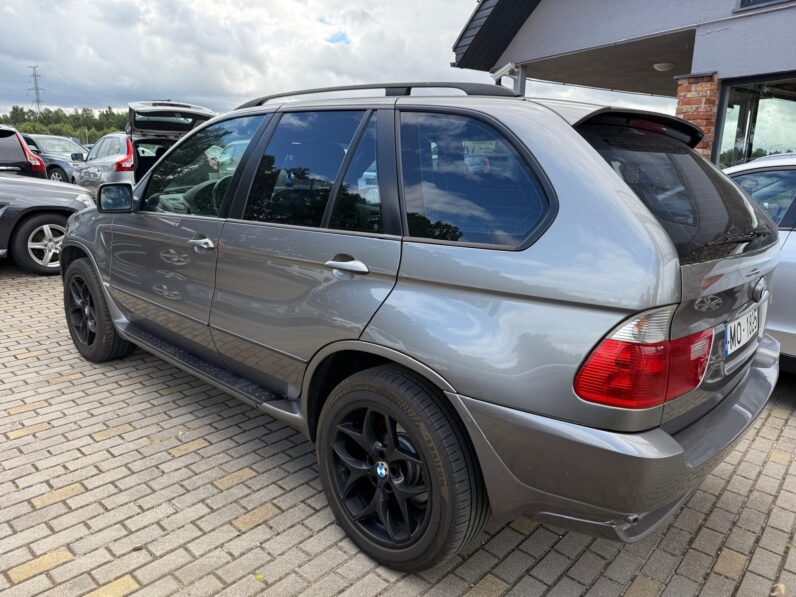 
								BMW X5 pilns									