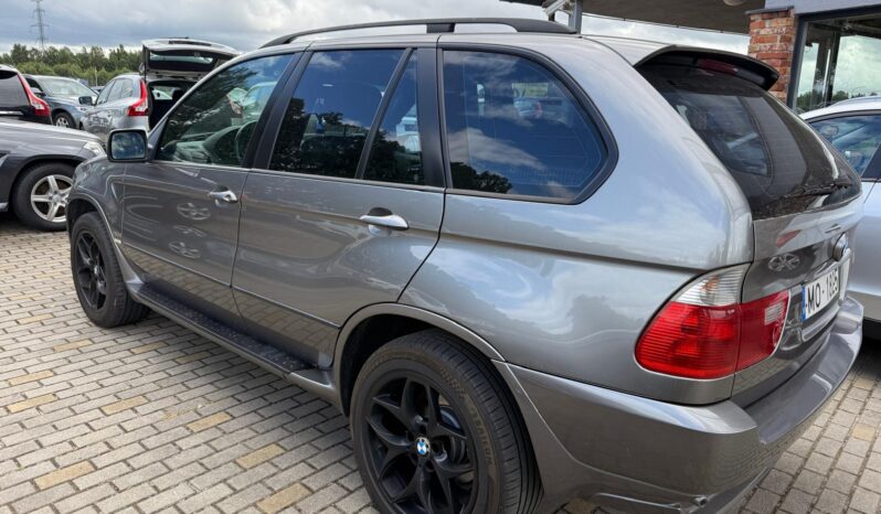 
								BMW X5 pilns									