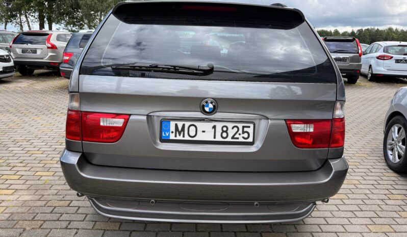 
								BMW X5 pilns									